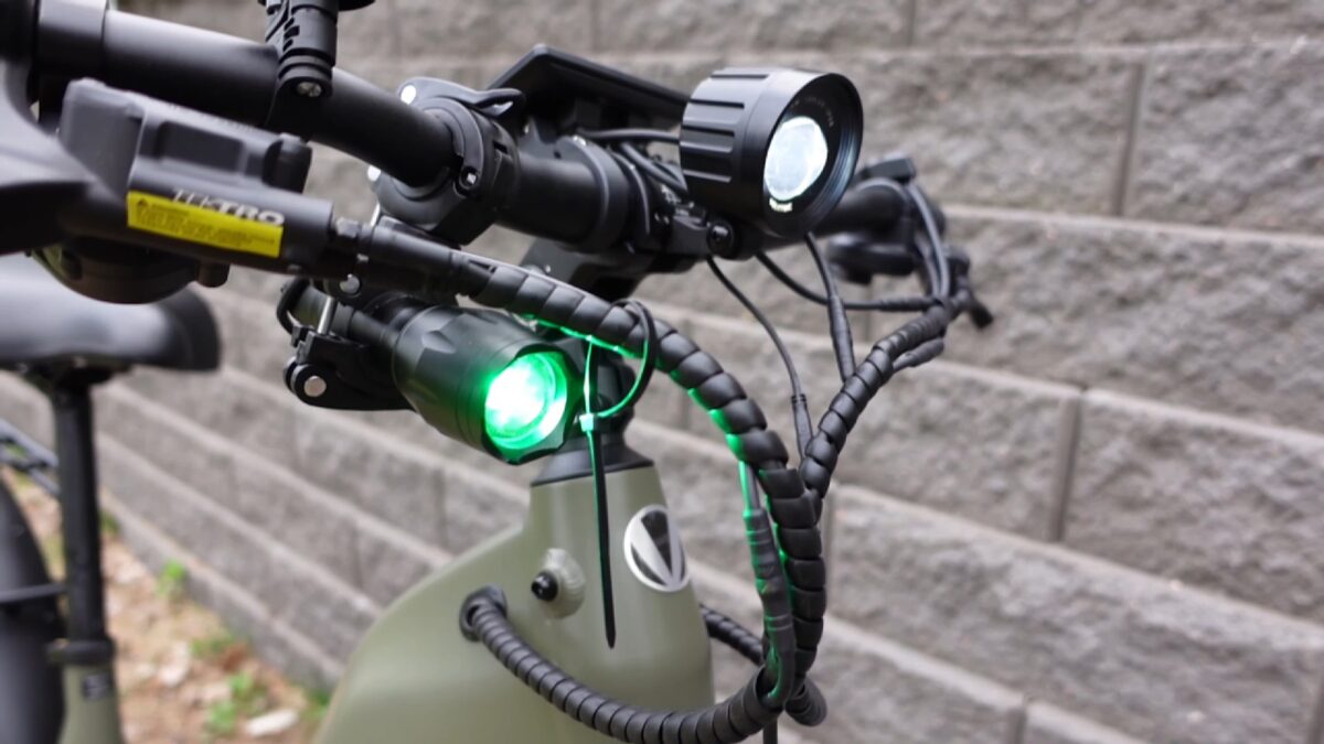 Included Detachable, Rechargable Green Flashlight on the Velotric Nomad 2X