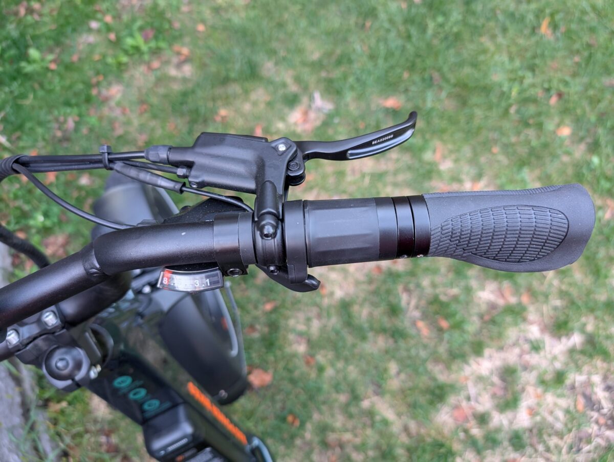A view of the half-twist throttle located on the right handlebar of the RadRunner Max.