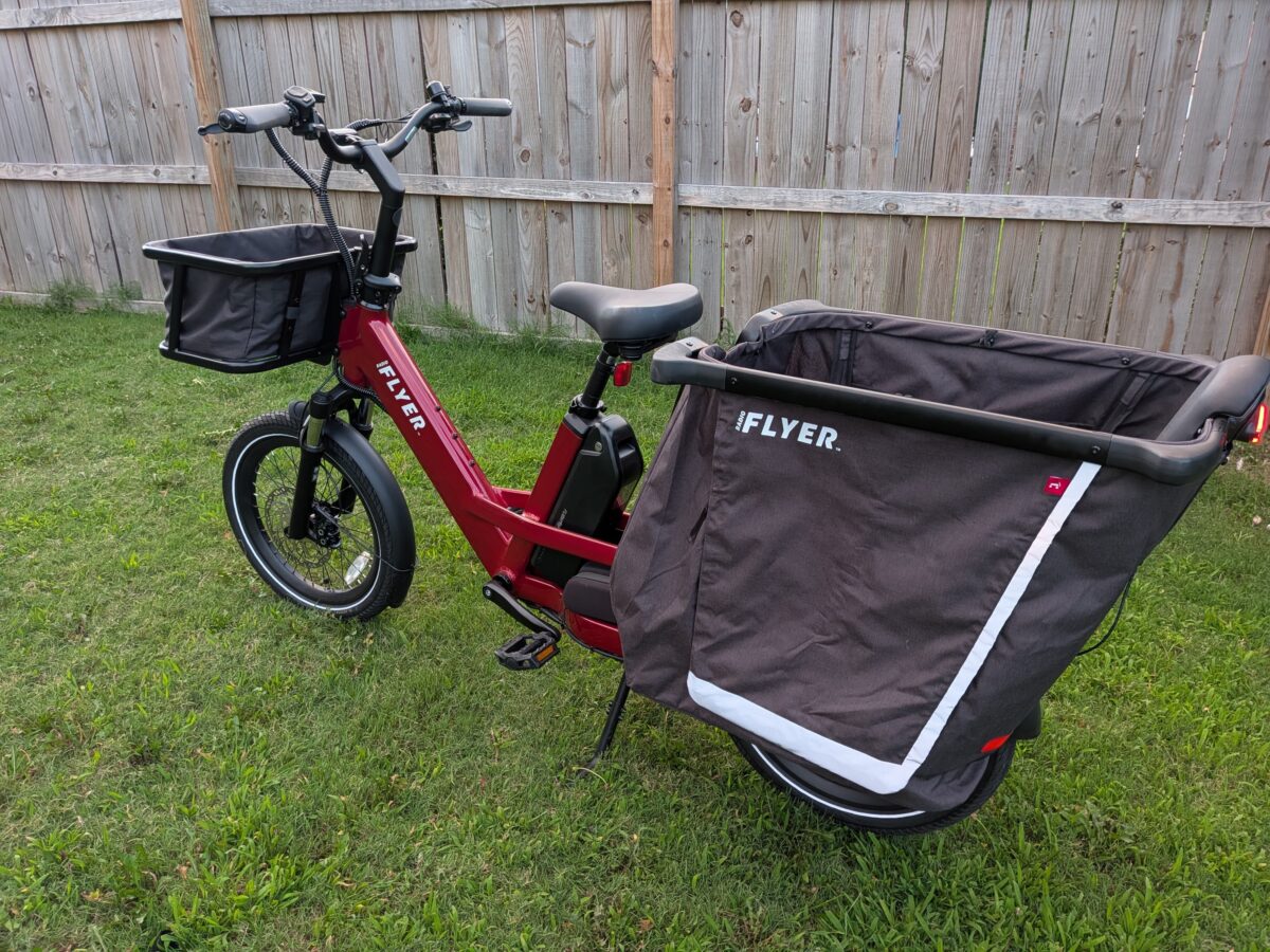Non-drive-side profile of the red Radio Flyer Flyer Loop cargo ebike