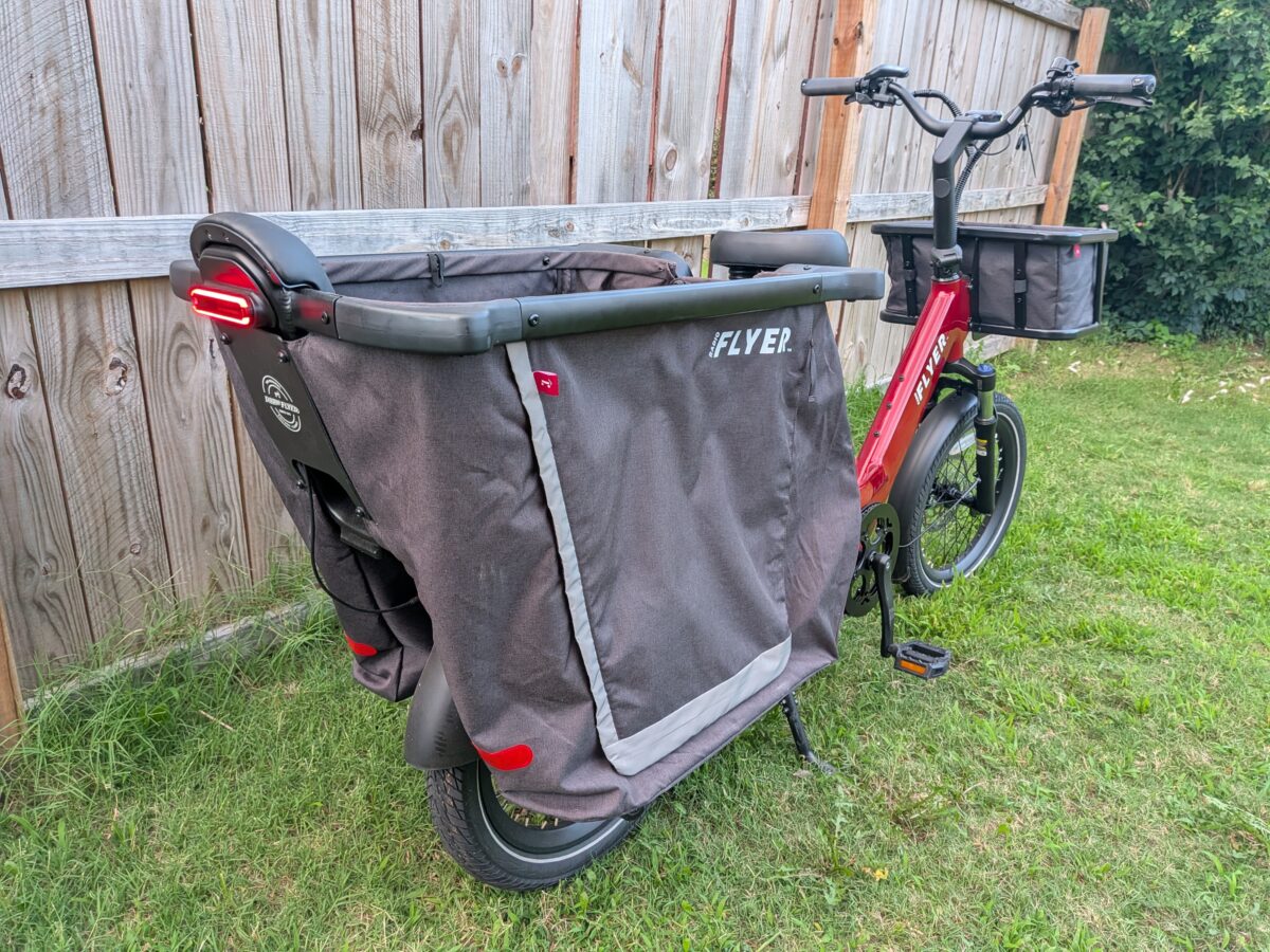Rear three-quarter view of the Radio Flyer Flyer Loop with rear cargo bag and taillight