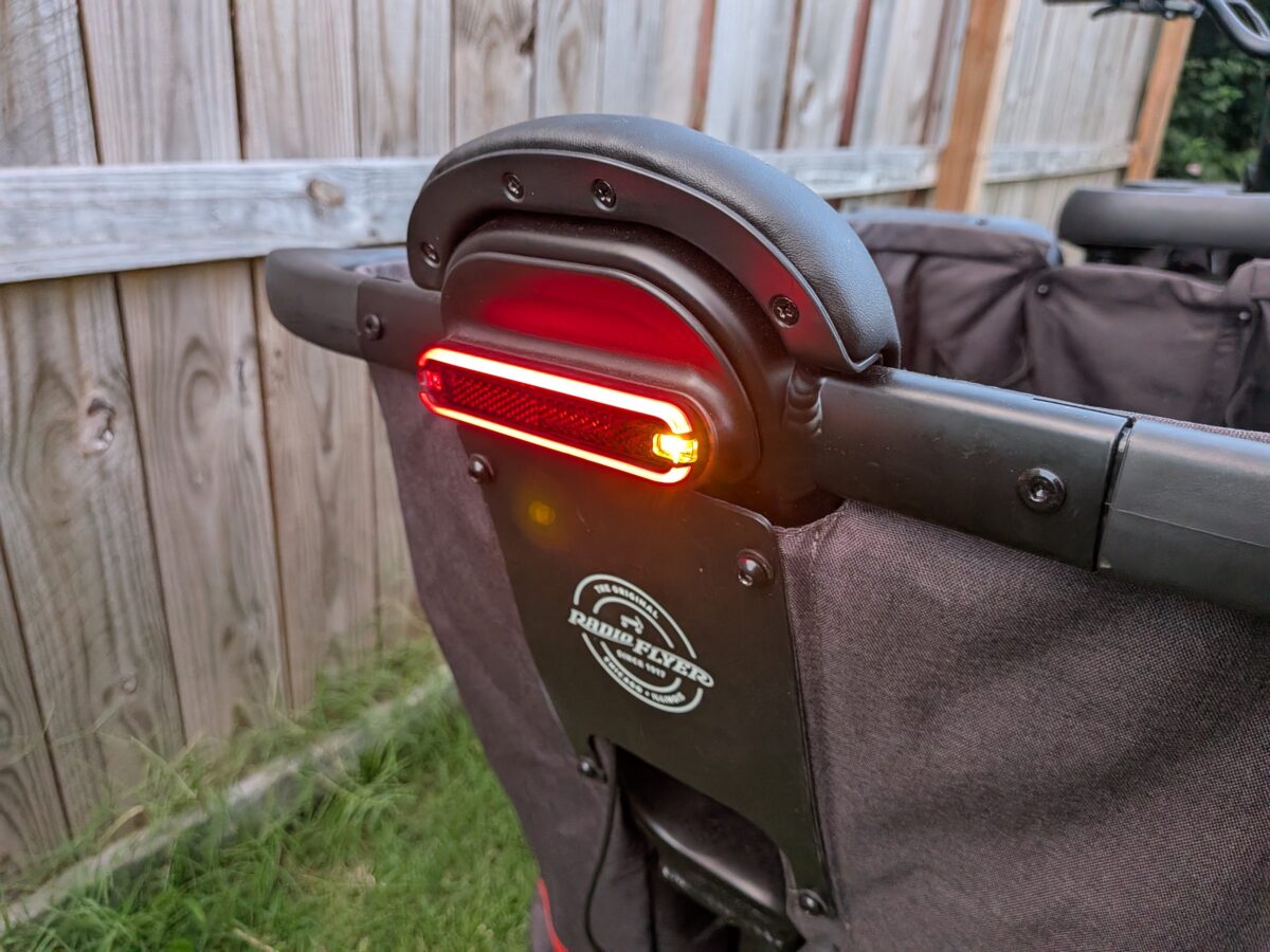 Integrated brake light and turn signals on the rear rack of the Radio Flyer Flyer Loop