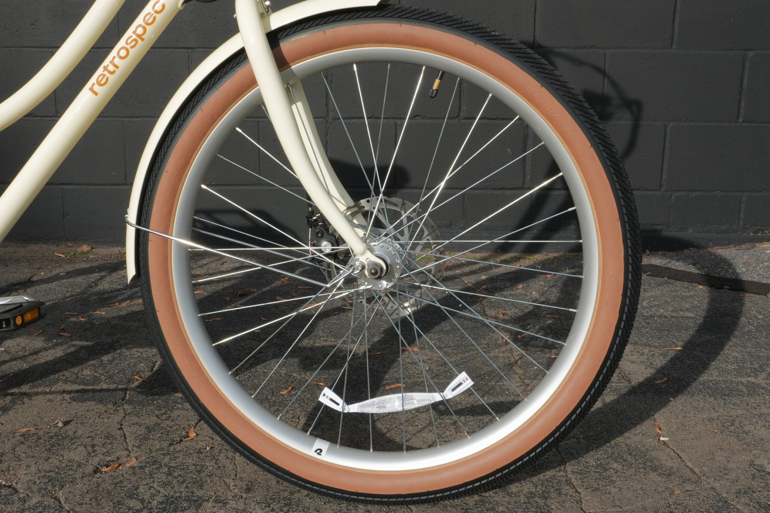 Retrospec Beaumont Rev 3 front wheel brown sidewall tire and alloy rim