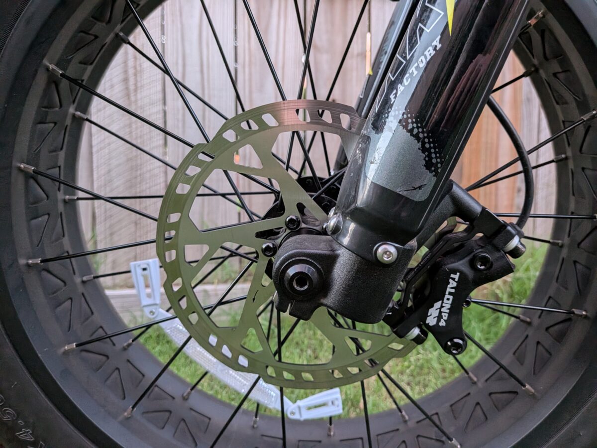 Talon P4 front brake caliper and rotor on the Juiced Scrambler Full Suspension