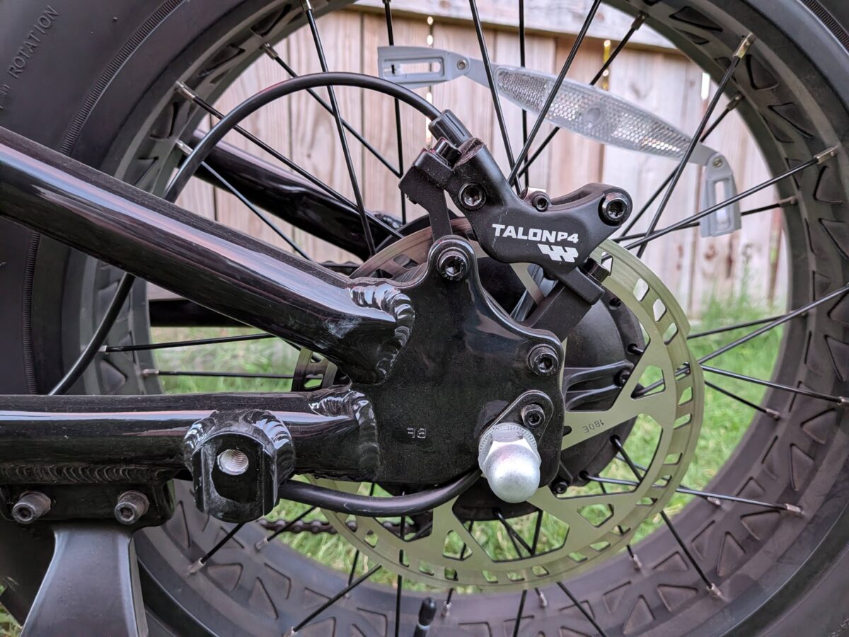 Talon P4 rear brake caliper and rotor on the Juiced Scrambler Full Suspension