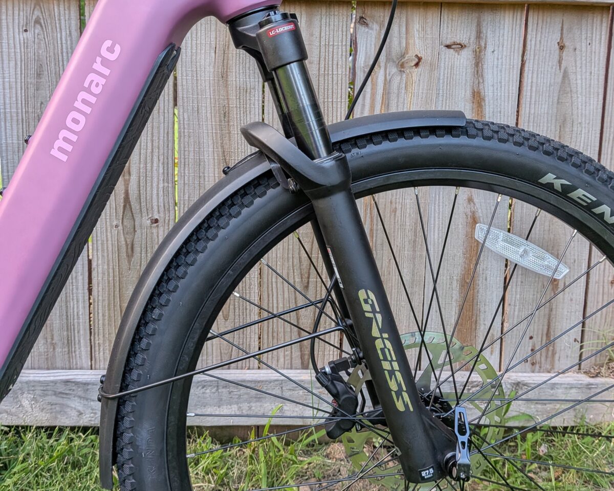 Profile view of the Gneiss reverse-arch suspension fork on the Monarc Tracer