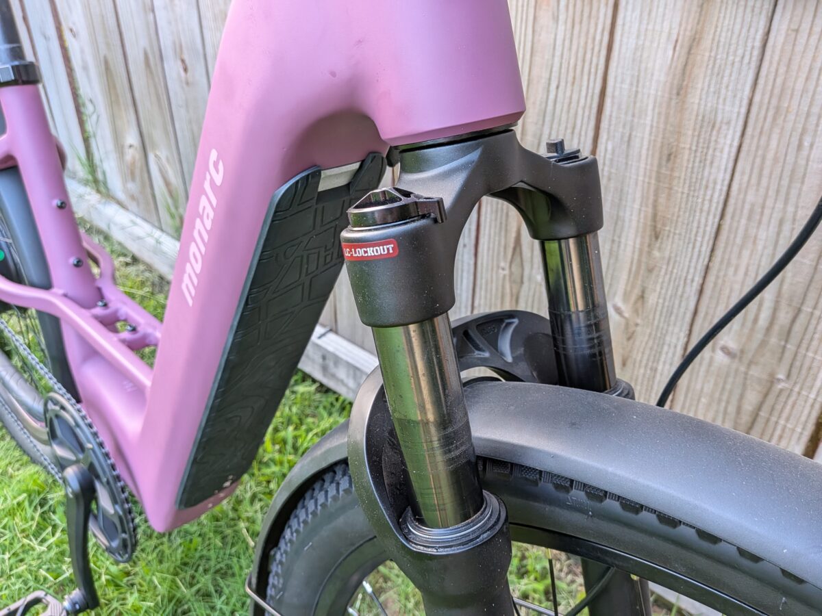 Reverse-arch fork stanchions with 80mm of travel on the Monarc Tracer