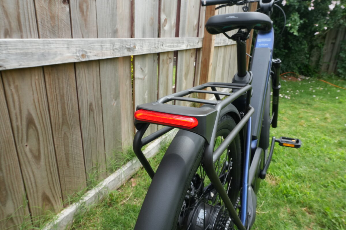 Rack-integrated taillight and brake light on the Segway Myon.
