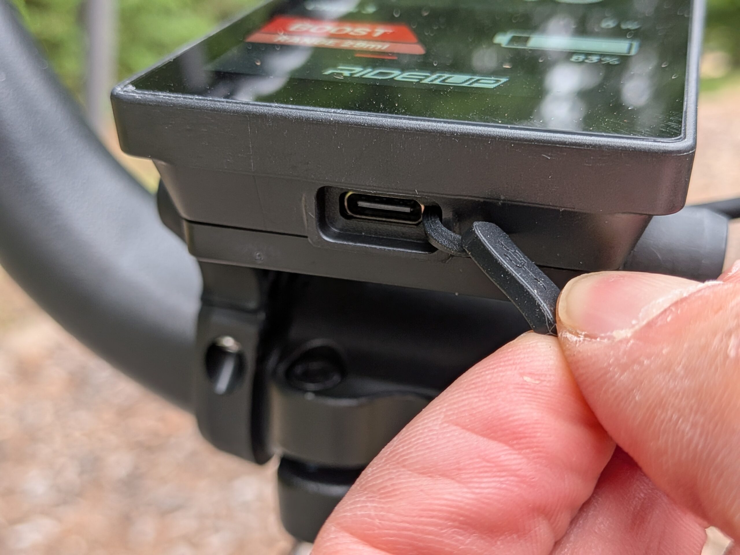 USB-C charging port beneath the display on the Ride1Up Portola 02