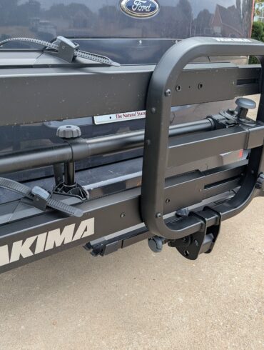 Yakima OnRamp LX hitch bike rack mounted on a vehicle