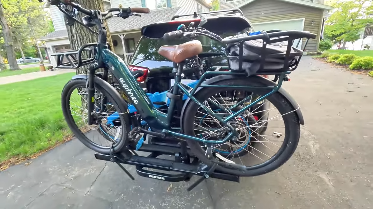 Two ebikes loaded on the Yakima OnRamp LX hitch bike rack