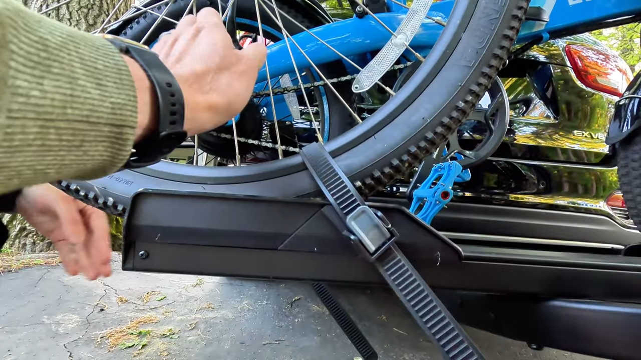 Extra long wheel strap threaded through the spokes on the Yakima OnRamp LX