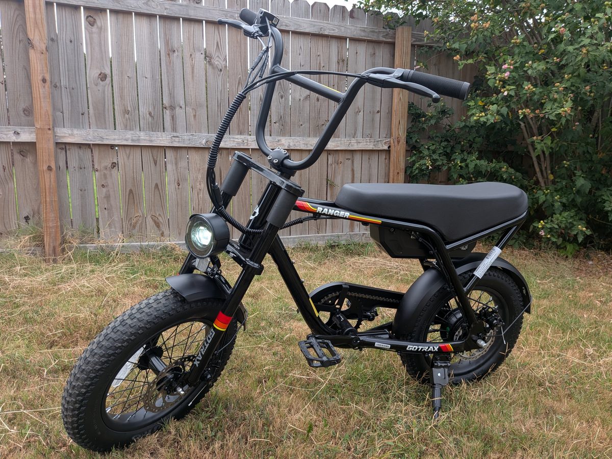 Gotrax Ranger 16 front three quarter view with headlight on