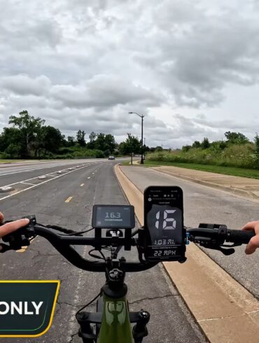 Monarc Marker display reading 16.3 mph next to a GPS speedometer app showing 16 mph on a BiKGrip phone holder