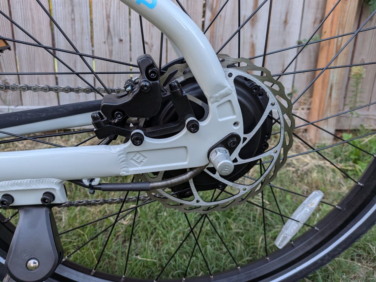 Rear hydraulic brake caliper and 180mm rotor on the Lectric XPress Lite