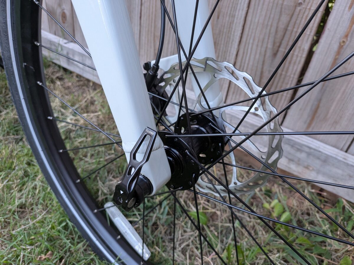 Front thru-axle and 180mm disc rotor on the Lectric XPress Lite